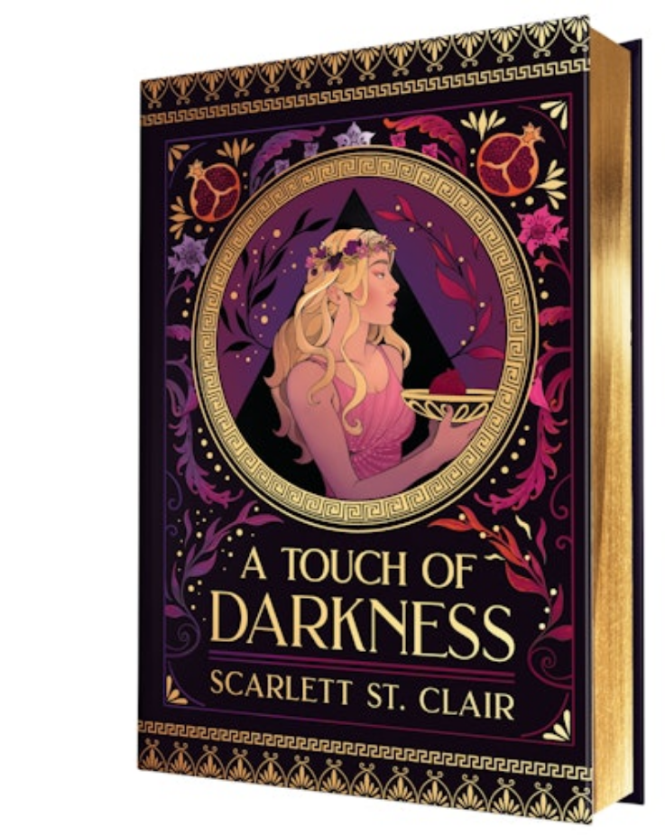 A book cover for 'A Touch of Darkness' by Scarlett St. Clair, featuring a dark purple and gold design with an illustration of a woman in profile, pomegranate motifs, and ornate decorative borders.