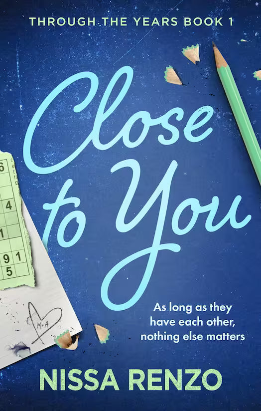 Book cover for 'Close to You' by Nissa Renzo, featuring a textured dark blue background with large light blue script title text, a green pencil, pencil shavings, and school-themed paper accents.