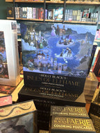 A stack 1000 piece puzzle boxes featuring an illustration of a fantasy landscape with buildings and people, titled 'Holly Black's Isles of Elfhame'.