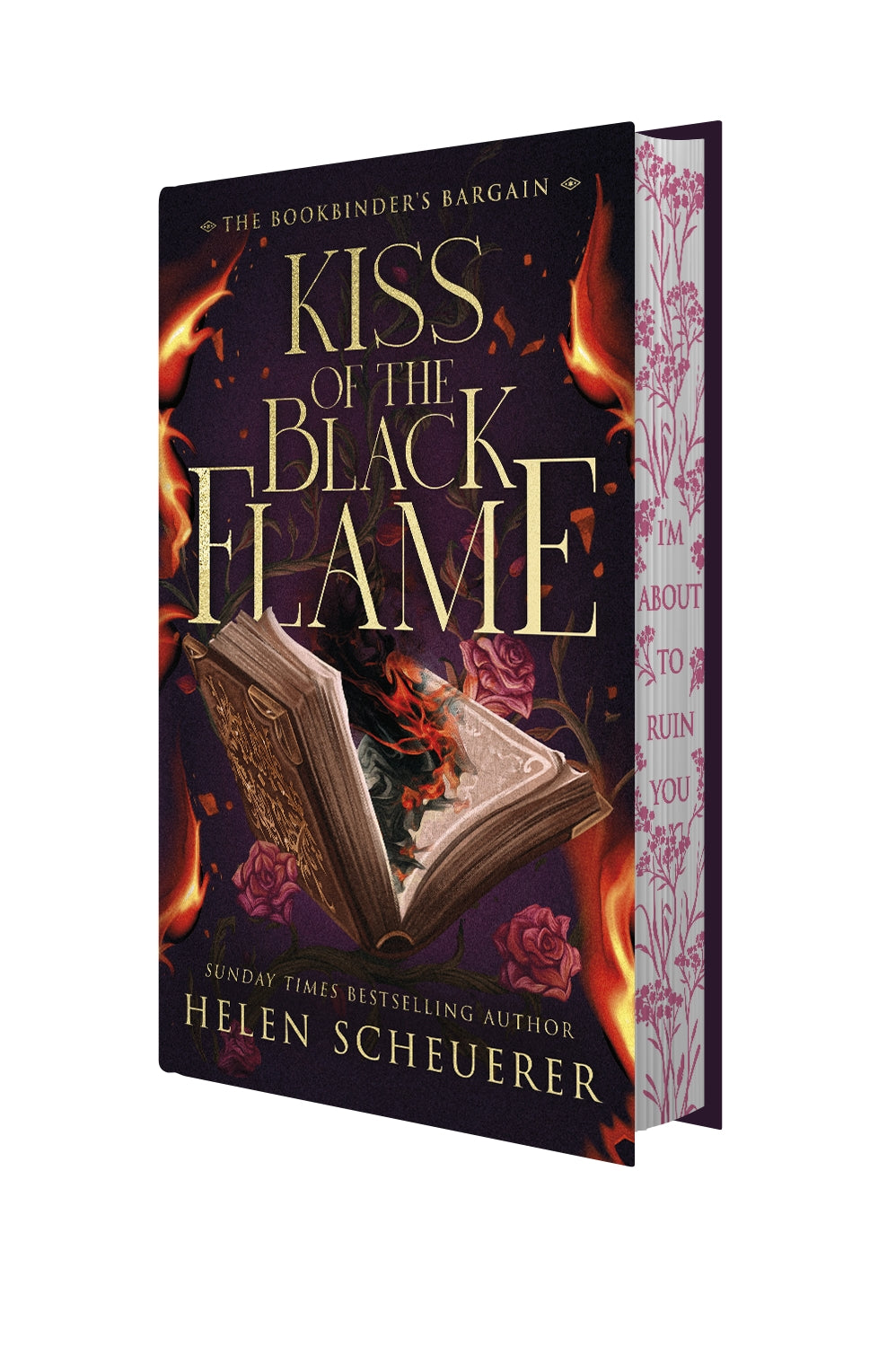 The special edition cover of 'Kiss of the Black Flame' by Helen Scheuerer, showing the front cover with a burning open book illustration and patterned pink-and-white sprayed edges, set against a plain white background.