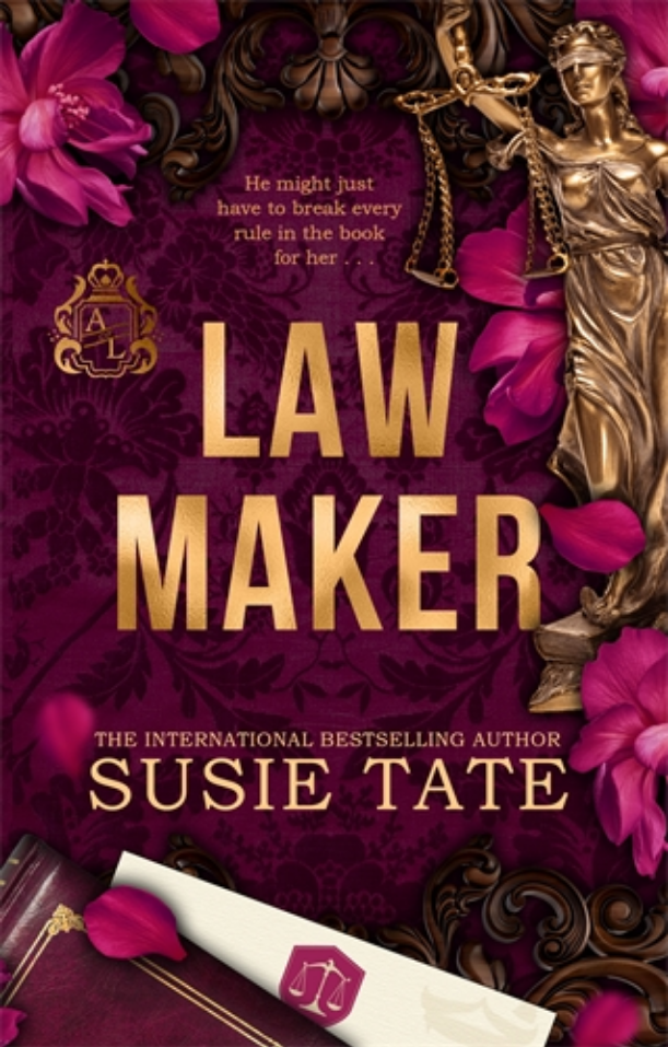 Book cover for 'Law Maker' by Susie Tate, featuring a deep purple damask pattern, large gold title text, pink roses, a bronze Lady Justice statue, and a white diploma scroll at the bottom.