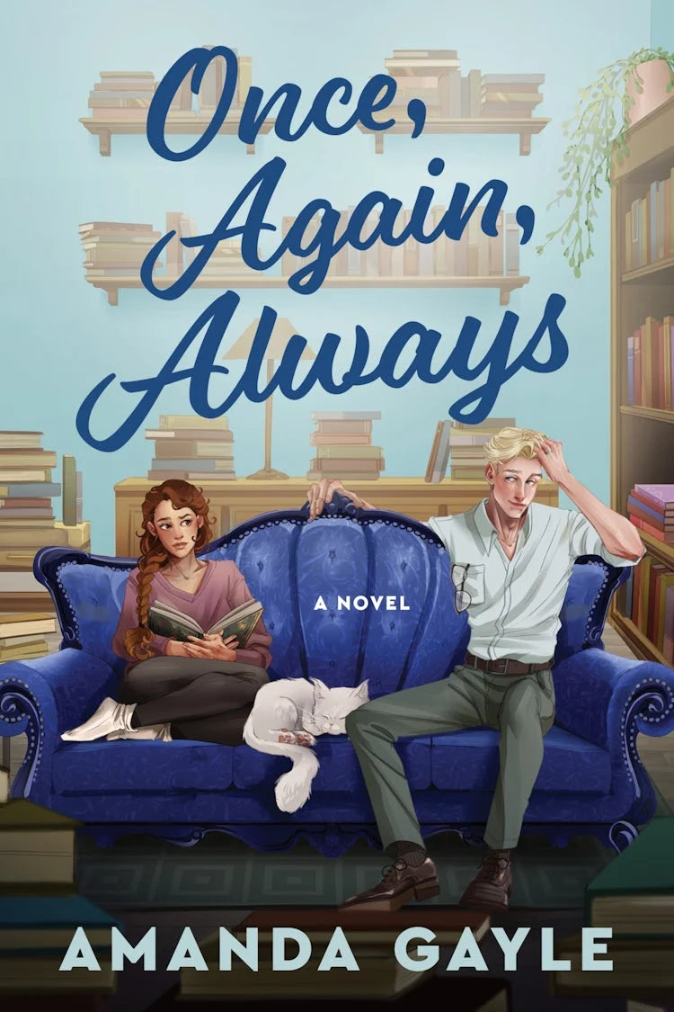 Book cover for Once, Again, Always by Amanda Gayle, featuring a man and a woman sitting on opposite ends of a blue sofa with a white cat sleeping between them. They are surrounded by books on shelves and surfaces.