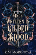 Book cover for Once Written in Gilded Blood by K.M. Moronova, Book Two in the Cruel Fates Duet, gilded text overlays blue flowers decorating a classical black and rose gold structure with a sword in the middle