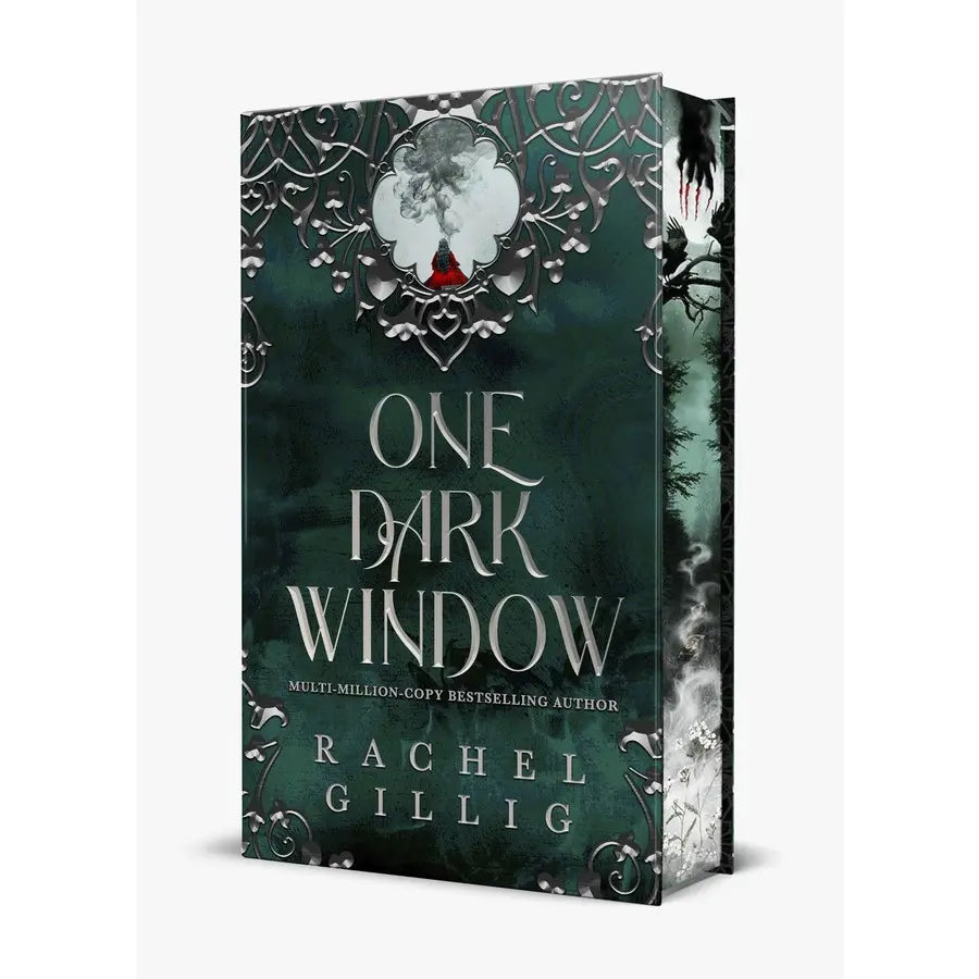 Book cover for the hardcover version o 'One Dark Window' by Rachel Gillig, featuring a dark teal-green background with ornate silver filigree, a pale skull illustration with a small red accent, and stylized title text.