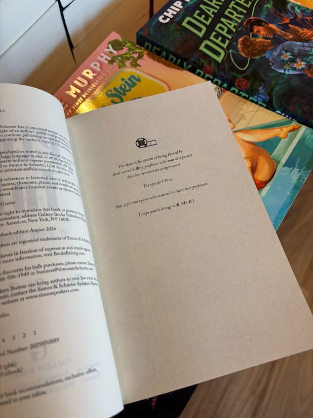 A copy of the book 'Pink Ink' by Avina St. Graves sits open to the dedication.