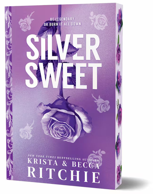 Book cover of 'Silver Sweet' by Krista & Becca Ritchie with a purple background and rose design and matching sprayed edges with purple roses.
