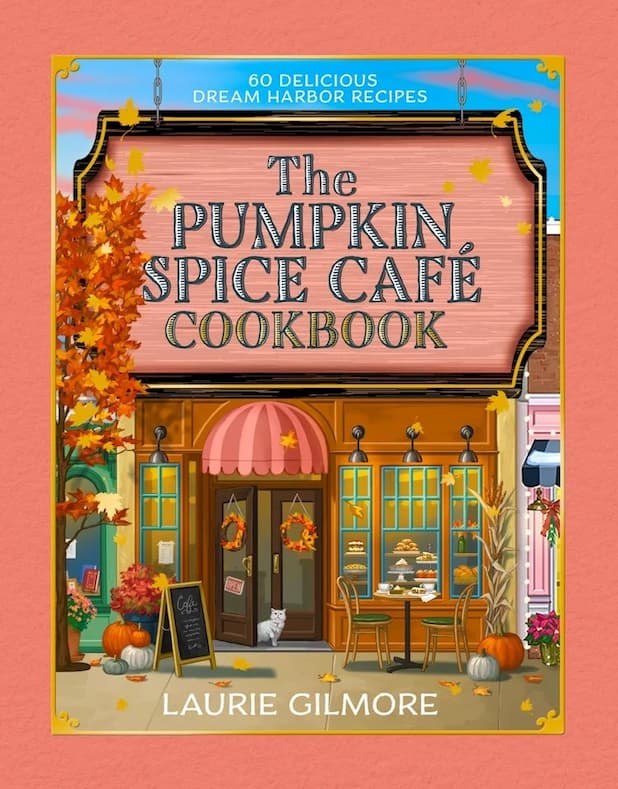 Cover of 'The Pumpkin Spice Café Cookbook' by Laurie Gilmore with a colorful illustration of a café.