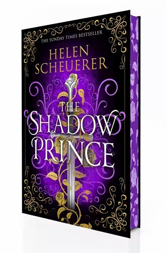 The book cover of 'The Shadow Prince' by Helen Scheuerer, featuring a dark purple and black background with ornate gold filigree, a silver sword, and white title lettering. The book is shown at an angle to display both the front cover and the purple sprayed edges.